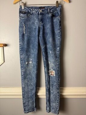 Ed Hardy Distressed Blue Skinny Jeans with Embroidered Crest